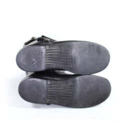 A pair of black, classic vintage leather motorcycle boots by Hein Gericke, size 44. The boots feature a timeless design with reinforced protection on the toes, heels, and a reinforced sole for the gear lever. They are in very good condition with minor use marks on the sole