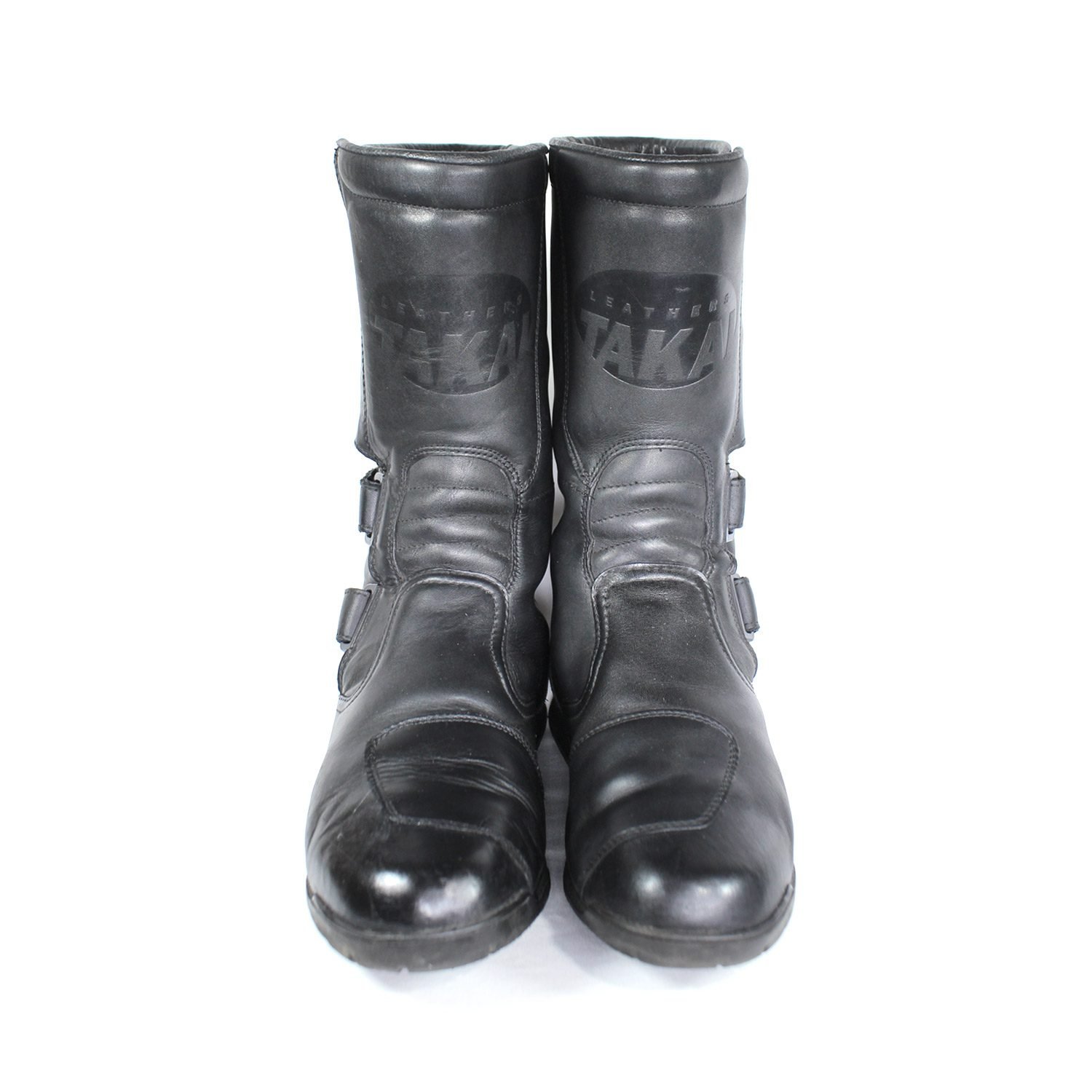 A pair of black leather Hein Gericke Takai touring boots in size 43. The boots feature a Climate waterproof membrane and protective reinforcements on the toes and heel, with gear and brake lever protection. They show some wear marks.