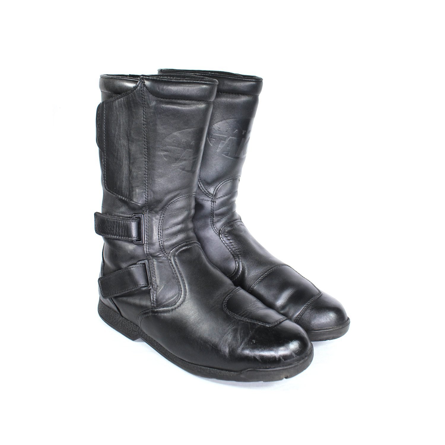 A pair of black leather Hein Gericke Takai touring boots in size 43. The boots feature a Climate waterproof membrane and protective reinforcements on the toes and heel, with gear and brake lever protection. They show some wear marks.