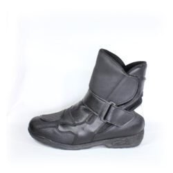 A pair of black leather Hein Gericke "Walk and Ride" street boots in size 41. The boots feature a Climate waterproof membrane, protection for the toes, shin, and heels, a reinforced sole, and rear reflectors. They show some wear marks, including a small break in the plastic brake lever protector.