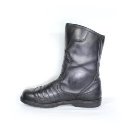 A pair of black leather Kochmann touring boots in size 41. The boots feature a SympaTex waterproof membrane and protective reinforcements on the toes, heels, ankles, and a reinforced sole with gear and brake lever protection. They show minor wear marks.
