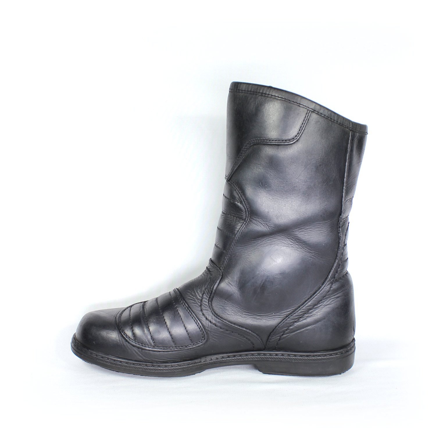 A pair of black leather Kochmann touring boots in size 41. The boots feature a SympaTex waterproof membrane and protective reinforcements on the toes, heels, ankles, and a reinforced sole with gear and brake lever protection. They show minor wear marks.