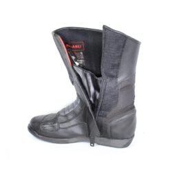 A pair of black leather MC MP-ASU Caronte touring boots in size 39. The boots feature protective reinforcements on the toes, shin, ankles, and heel, with a reinforced sole and gear/brake lever protection. They are in fairly good condition with some wear marks and are no longer waterproof.