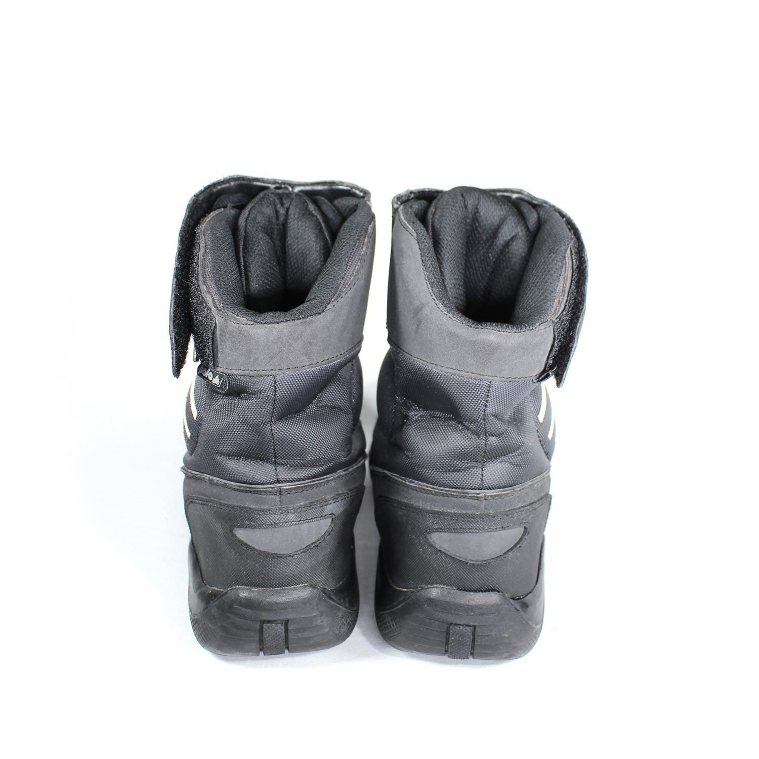 A pair of dark grey Polo Firefox city boots in size 41, made of synthetic suede leather. The boots feature protective reinforcements on the toes, ankles, and heels, along with a reinforced sole and gear/brake lever protection. They show some wear marks.