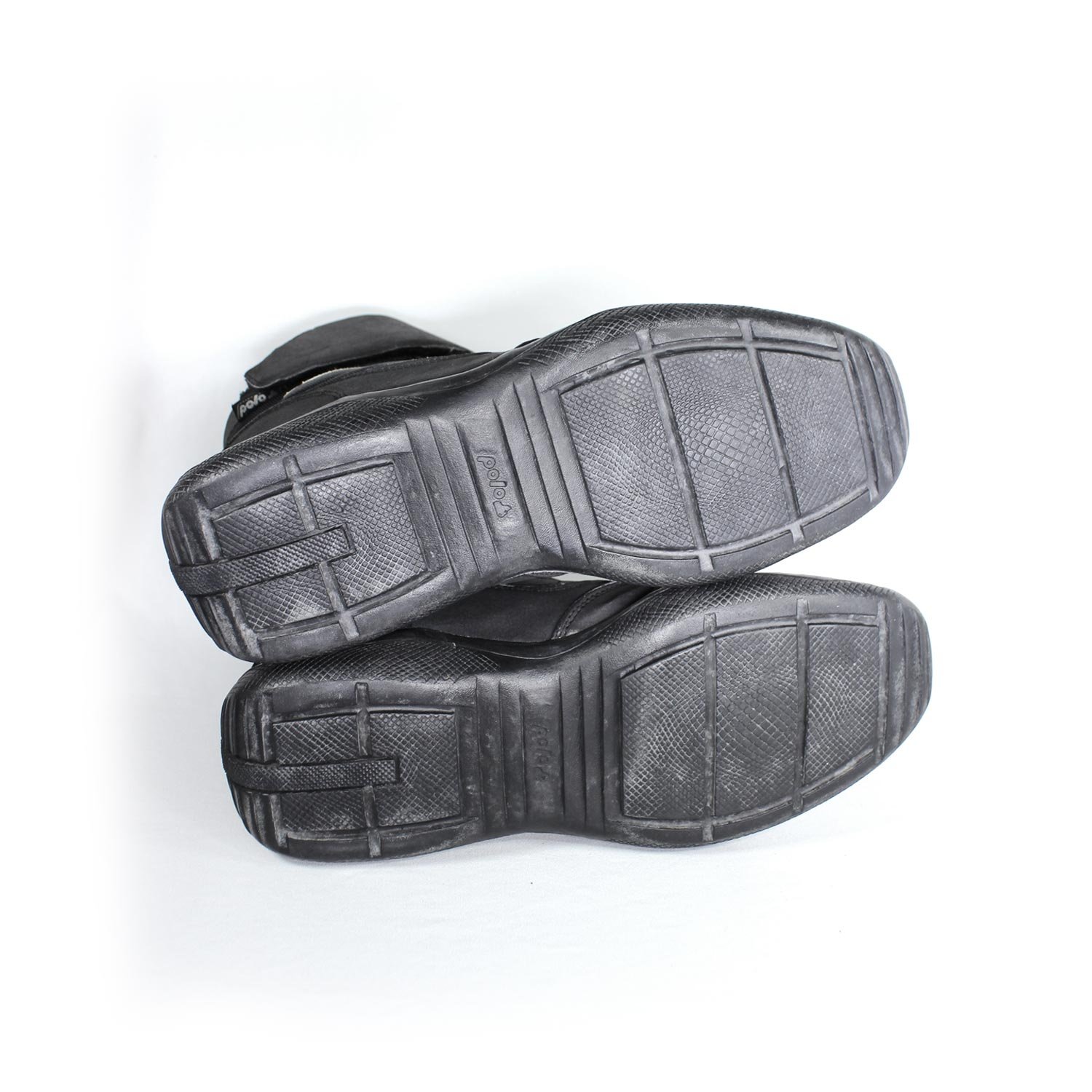 A pair of dark grey Polo Firefox city boots in size 41, made of synthetic suede leather. The boots feature protective reinforcements on the toes, ankles, and heels, along with a reinforced sole and gear/brake lever protection. They show some wear marks.