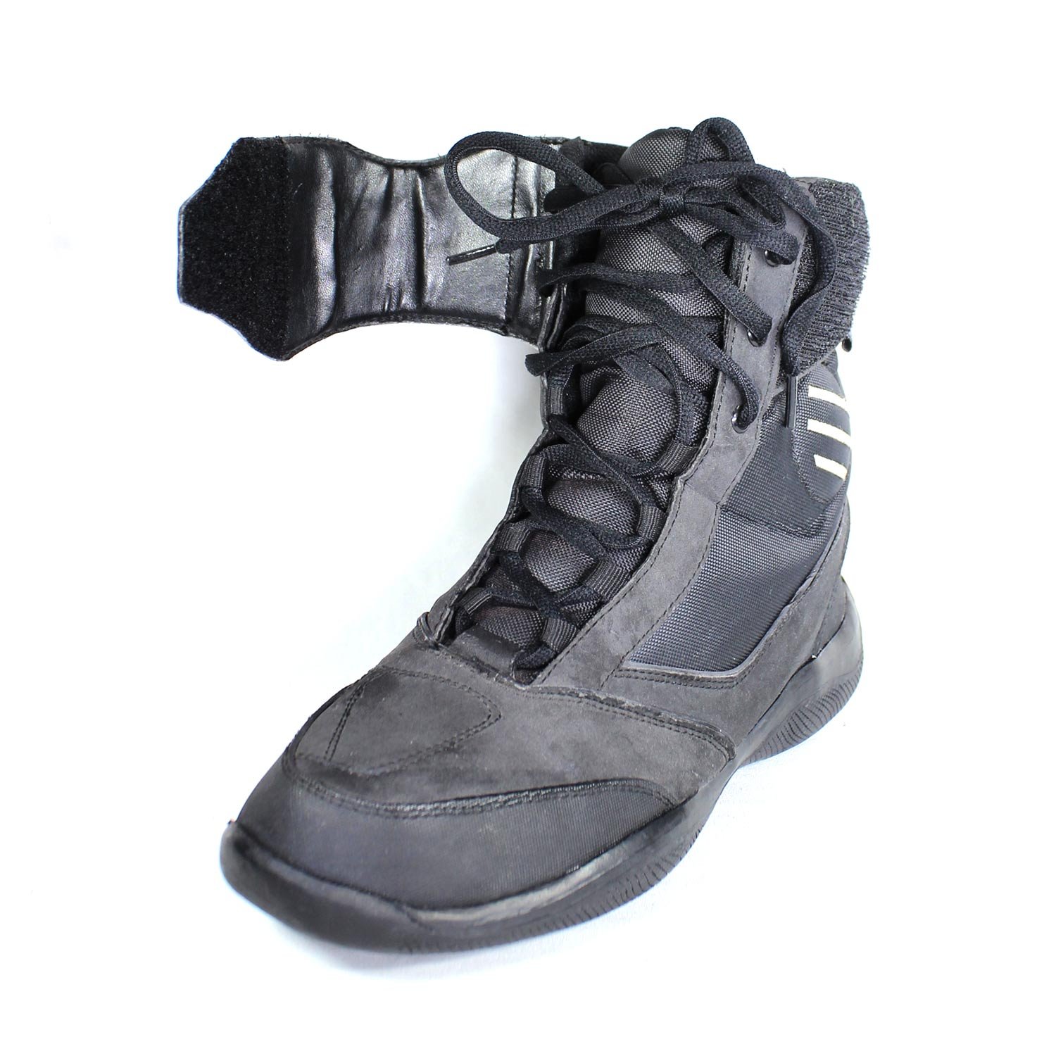 A pair of dark grey Polo Firefox city boots in size 41, made of synthetic suede leather. The boots feature protective reinforcements on the toes, ankles, and heels, along with a reinforced sole and gear/brake lever protection. They show some wear marks.