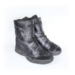 A pair of black leather Probiker women's casual riding boots in size 37. The boots feature ankle protection, a reinforced sole, and an air chamber in the sole for comfort while walking. They show minor wear marks.