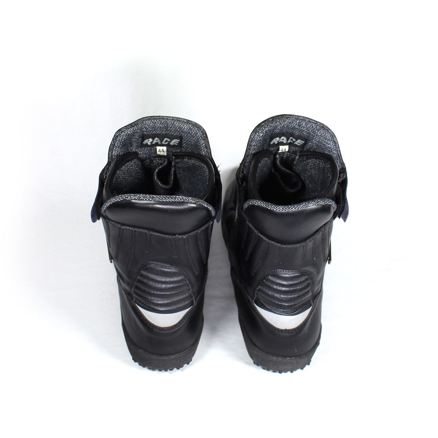 A pair of black leather street boots, size 44. The boots feature a Dintex waterproof membrane, reinforced protection on the toes, heels, and ankles, and reflective elements for visibility. They show minor wear marks