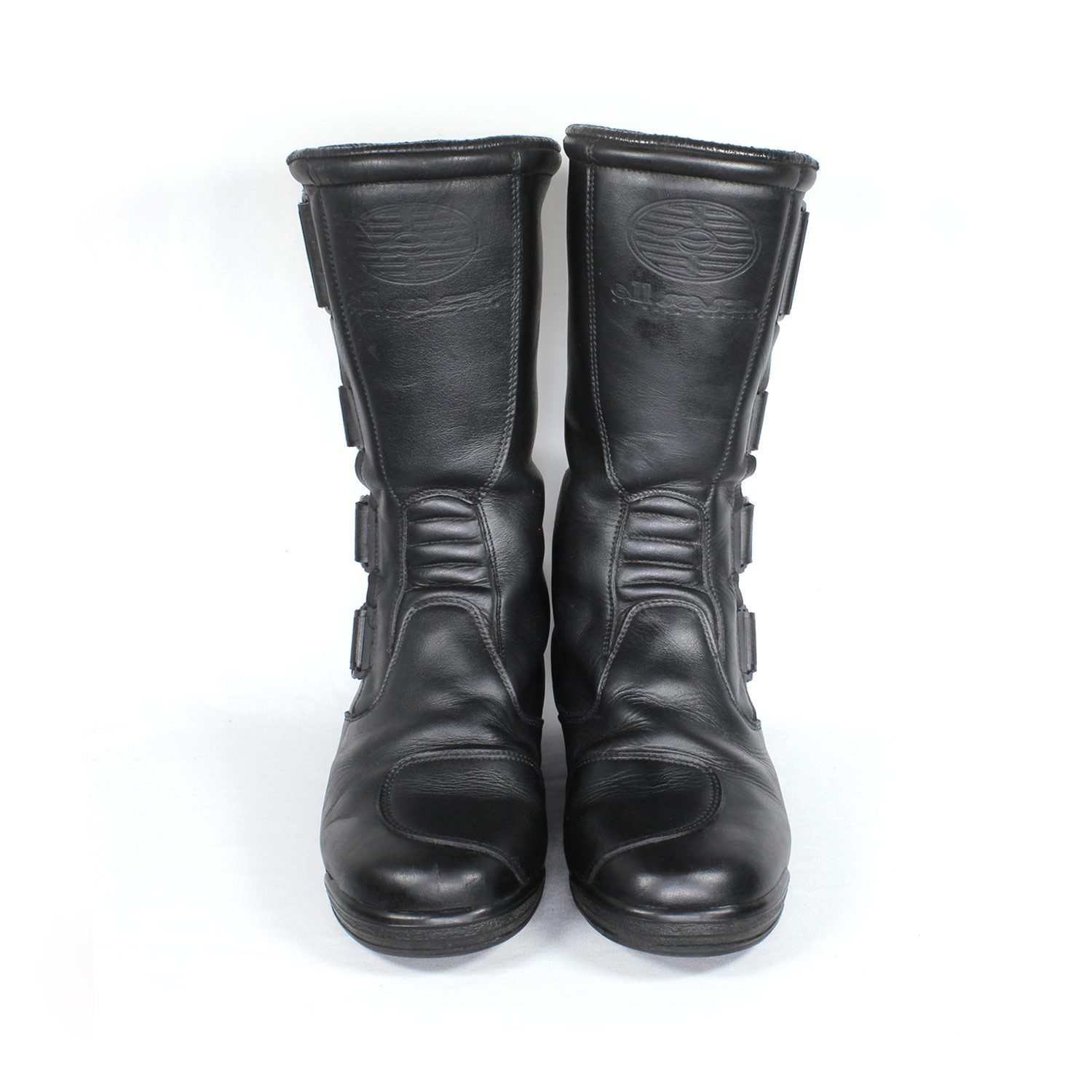 Sidi All-Season black leather motorcycle boots, size 42 — touring boots made in cooperation with Hein Gericke, featuring Sympatex waterproof membrane, reinforced toe, heel, and ankle protection, and good condition with minor wear marks.