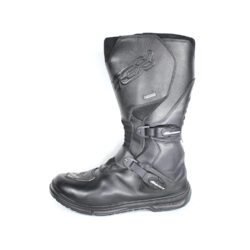 A pair of black TCX Infinity Evo GTX adventure touring boots in size 43, made of leather. They feature a Gore-Tex waterproof membrane, a Michelin® adventure rubber sole, two adjustable aluminum buckles, and extensive protection for the toes, shin, ankles, and heels. The boots are in very good condition with minor wear marks.