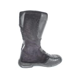 A pair of black TCX Infinity Evo GTX adventure touring boots in size 43, made of leather. They feature a Gore-Tex waterproof membrane, a Michelin® adventure rubber sole, two adjustable aluminum buckles, and extensive protection for the toes, shin, ankles, and heels. The boots are in very good condition with minor wear marks.