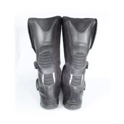 A pair of black TCX Infinity Evo GTX adventure touring boots in size 43, made of leather. They feature a Gore-Tex waterproof membrane, a Michelin® adventure rubber sole, two adjustable aluminum buckles, and extensive protection for the toes, shin, ankles, and heels. The boots are in very good condition with minor wear marks.