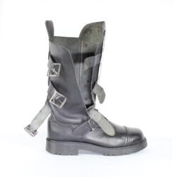 A pair of black leather Chopper-style cruiser boots by Underground Shoes in size 39. The boots feature a classic English design with metallic hardware accents and protective reinforcements on the toe, shin, and heel. They are in very good condition with minor wear marks.