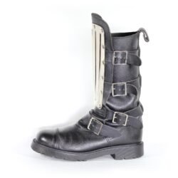 A pair of black leather Chopper-style cruiser boots by Underground Shoes in size 39. The boots feature a classic English design with metallic hardware accents and protective reinforcements on the toe, shin, and heel. They are in very good condition with minor wear marks.