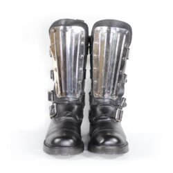 A pair of black leather Chopper-style cruiser boots by Underground Shoes in size 39. The boots feature a classic English design with metallic hardware accents and protective reinforcements on the toe, shin, and heel. They are in very good condition with minor wear marks.