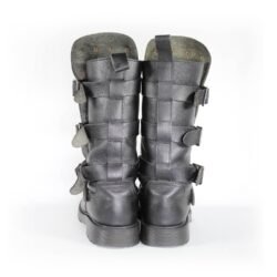 A pair of black leather Chopper-style cruiser boots by Underground Shoes in size 39. The boots feature a classic English design with metallic hardware accents and protective reinforcements on the toe, shin, and heel. They are in very good condition with minor wear marks.