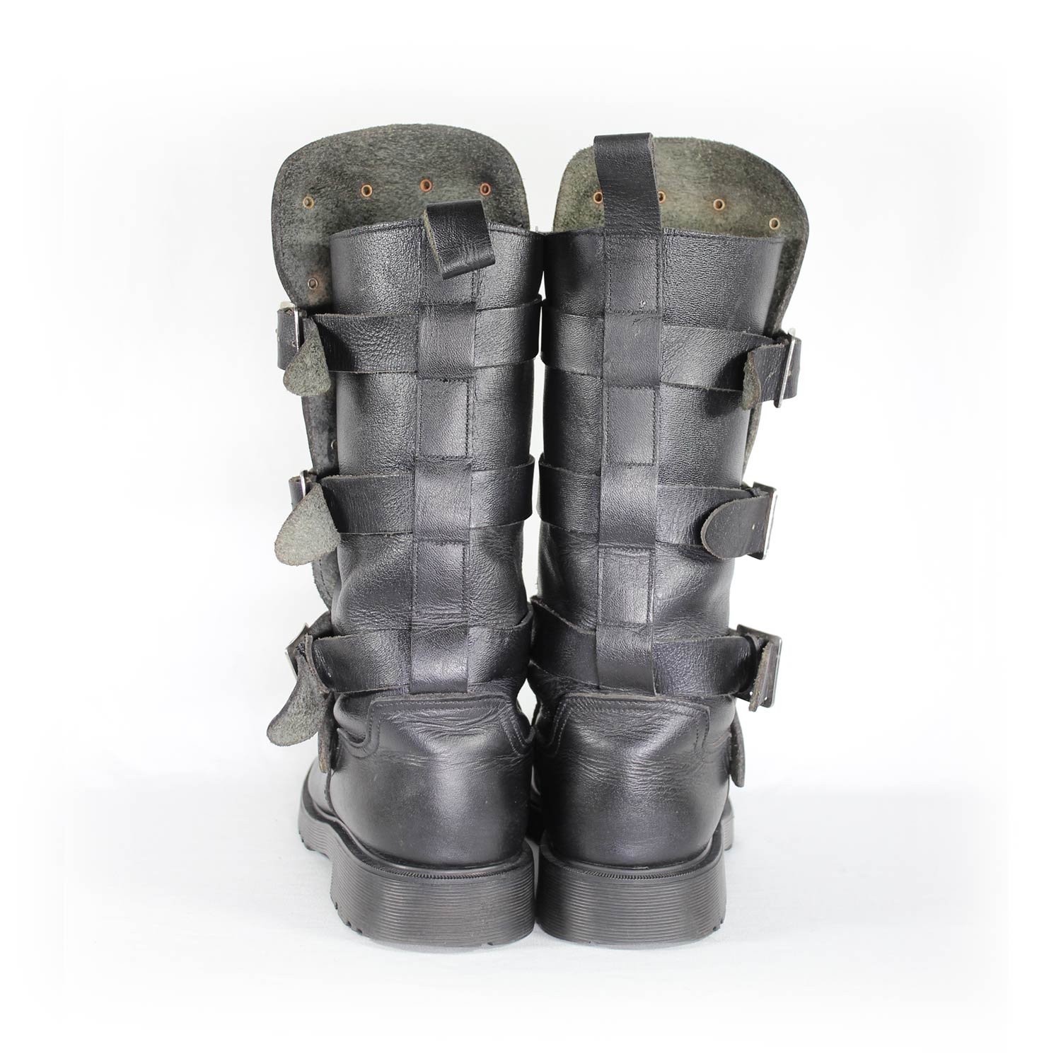 A pair of black leather Chopper-style cruiser boots by Underground Shoes in size 39. The boots feature a classic English design with metallic hardware accents and protective reinforcements on the toe, shin, and heel. They are in very good condition with minor wear marks.