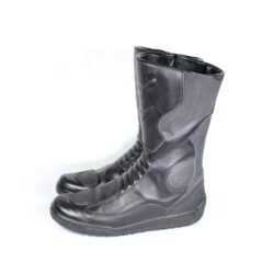 Side view of black UVEX Laguna Seca motorcycle boots in size 45. The boots are constructed from leather and synthetic materials, showing a reinforced toe box, shin protector, and ankle armor on the outer sides.