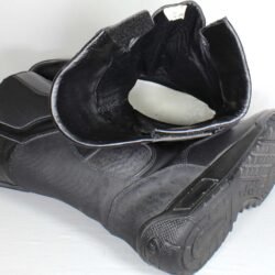 Side view of black UVEX Laguna Seca motorcycle boots in size 45. The boots are constructed from leather and synthetic materials, showing a reinforced toe box, shin protector, and ankle armor on the outer sides.