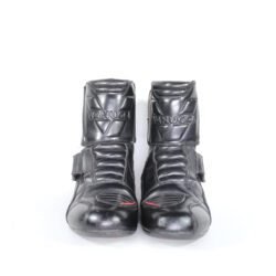 A pair of black Vanucci VTB4 short touring boots in size 41, made of nappa leather. They feature carbon fiber side panels, a Sympatex waterproof membrane, and protective reinforcements on the toes, shin, ankles, and heel. The boots show some wear marks.