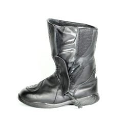 A pair of black Alpinestars high-quality leather motorcycle boots, size 38, in good condition. Made of cowhide leather with a Gore-Tex membrane, featuring reinforced protection for the toes, heel, shin, ankles, and sole. Shows typical leather wear and a minor flaw on one reflective stripe.