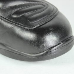 A pair of black Alpinestars high-quality leather motorcycle boots, size 38, in good condition. Made of cowhide leather with a Gore-Tex membrane, featuring reinforced protection for the toes, heel, shin, ankles, and sole. Shows typical leather wear and a minor flaw on one reflective stripe.