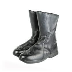 A pair of black Alpinestars high-quality leather motorcycle boots, size 38, in good condition. Made of cowhide leather with a Gore-Tex membrane, featuring reinforced protection for the toes, heel, shin, ankles, and sole. Shows typical leather wear and a minor flaw on one reflective stripe.