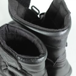 A pair of black synthetic leather motorcycle boots, size 37, in fair condition. Features typical touring and street styling with protection for the toes, heel, shin, and sole. Shows signs of aging, including cracks and wrinkles on the PU-leather.