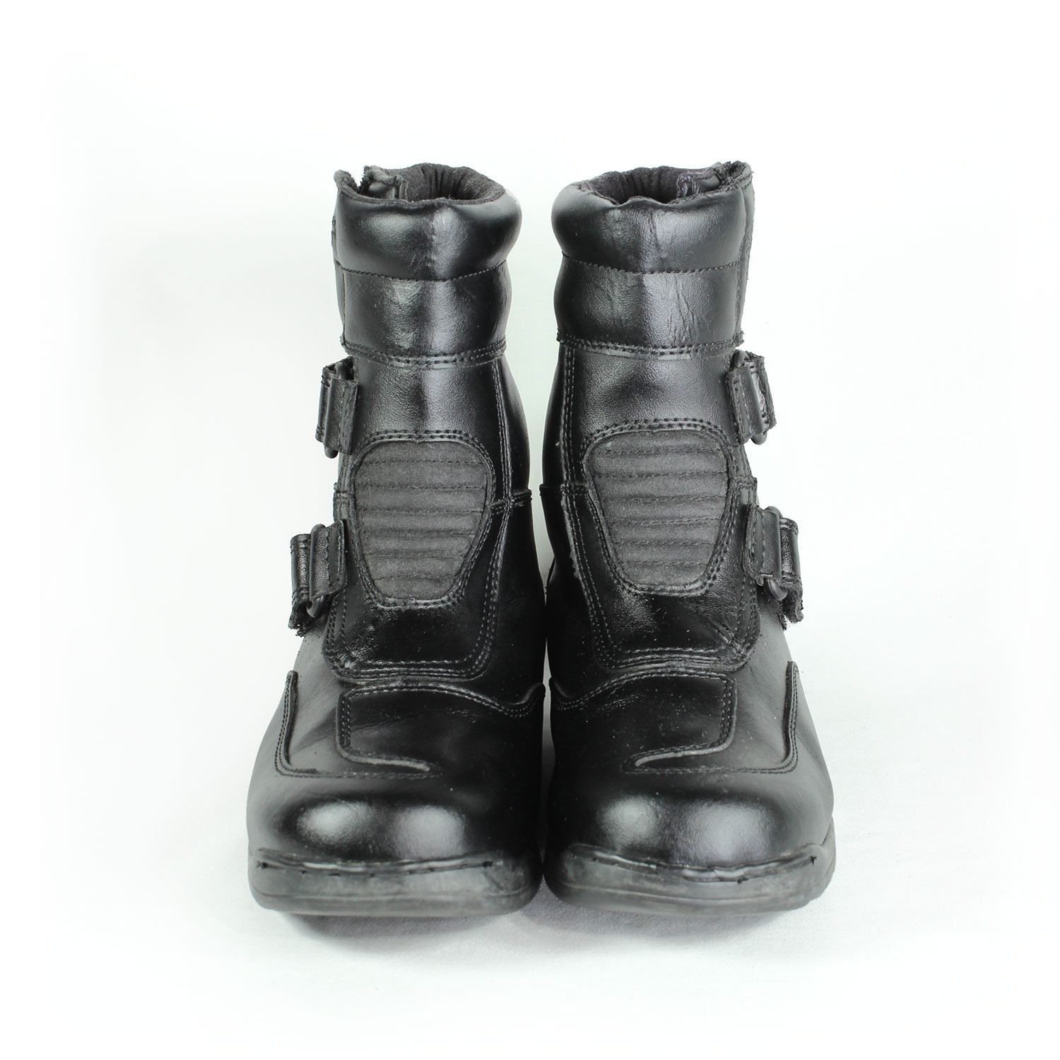 A pair of black synthetic leather motorcycle boots, size 37, in fair condition. Features typical touring and street styling with protection for the toes, heel, shin, and sole. Shows signs of aging, including cracks and wrinkles on the PU-leather.