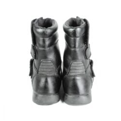 A pair of black synthetic leather motorcycle boots, size 37, in fair condition. Features typical touring and street styling with protection for the toes, heel, shin, and sole. Shows signs of aging, including cracks and wrinkles on the PU-leather.