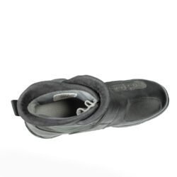 A pair of black Daytona Shorty perforated leather motorcycle boots, size 43, in very good condition. Features full-grain cowhide construction, ankle protectors, a non-slip sole, and a climate insole for warm-weather riding. Shows minor wear, including a small spot on the side.