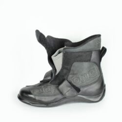 A pair of black Daytona Shorty perforated leather motorcycle boots, size 43, in very good condition. Features full-grain cowhide construction, ankle protectors, a non-slip sole, and a climate insole for warm-weather riding. Shows minor wear, including a small spot on the side.