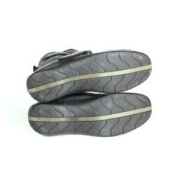 A pair of black Daytona Shorty perforated leather motorcycle boots, size 43, in very good condition. Features full-grain cowhide construction, ankle protectors, a non-slip sole, and a climate insole for warm-weather riding. Shows minor wear, including a small spot on the side.