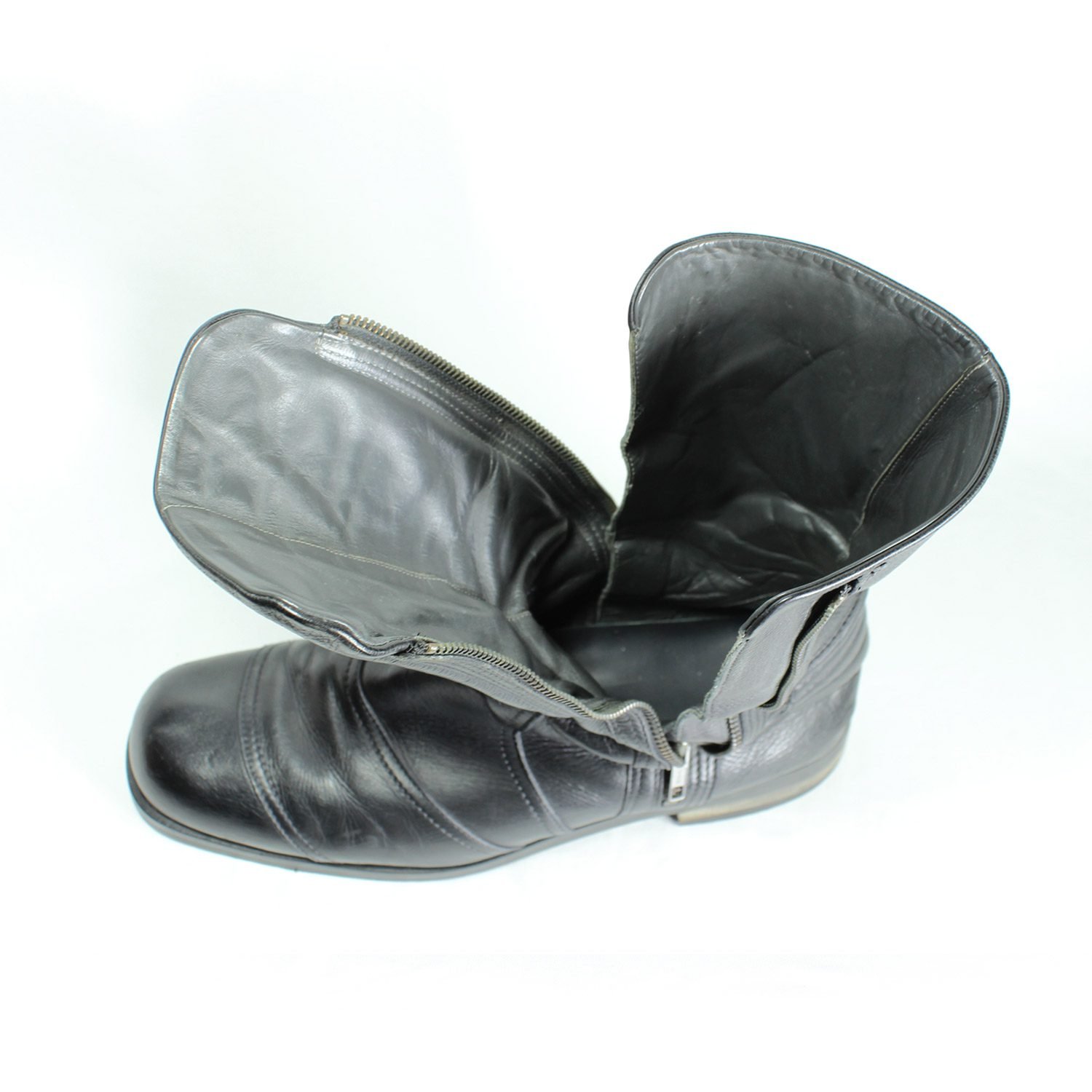 A pair of black Hugo Boss high-quality leather boots, size 47, in good condition. Features a classic, rugged cruiser-style look suitable for motorcycle riding. Made from durable leather with typical minor wear marks and wrinkles.