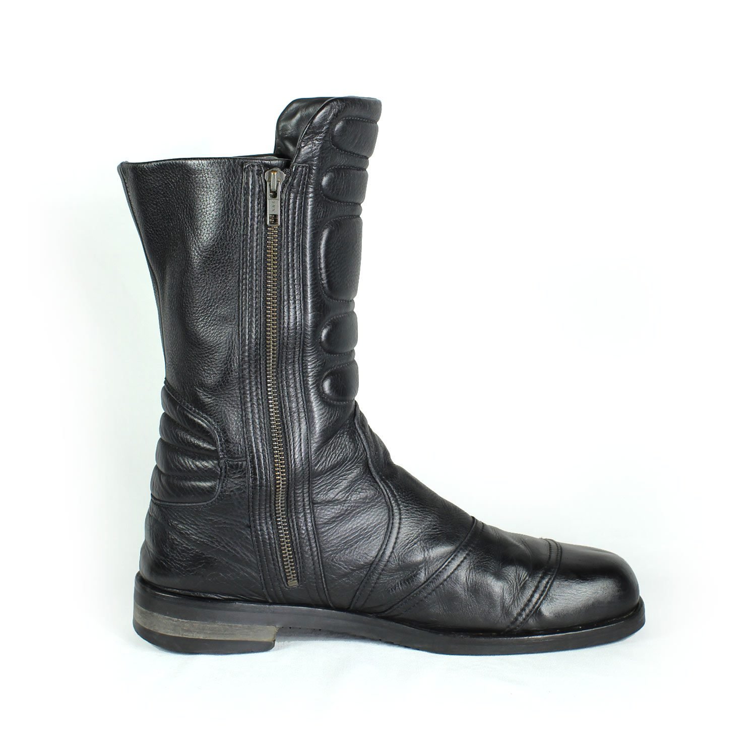A pair of black Hugo Boss high-quality leather boots, size 47, in good condition. Features a classic, rugged cruiser-style look suitable for motorcycle riding. Made from durable leather with typical minor wear marks and wrinkles.