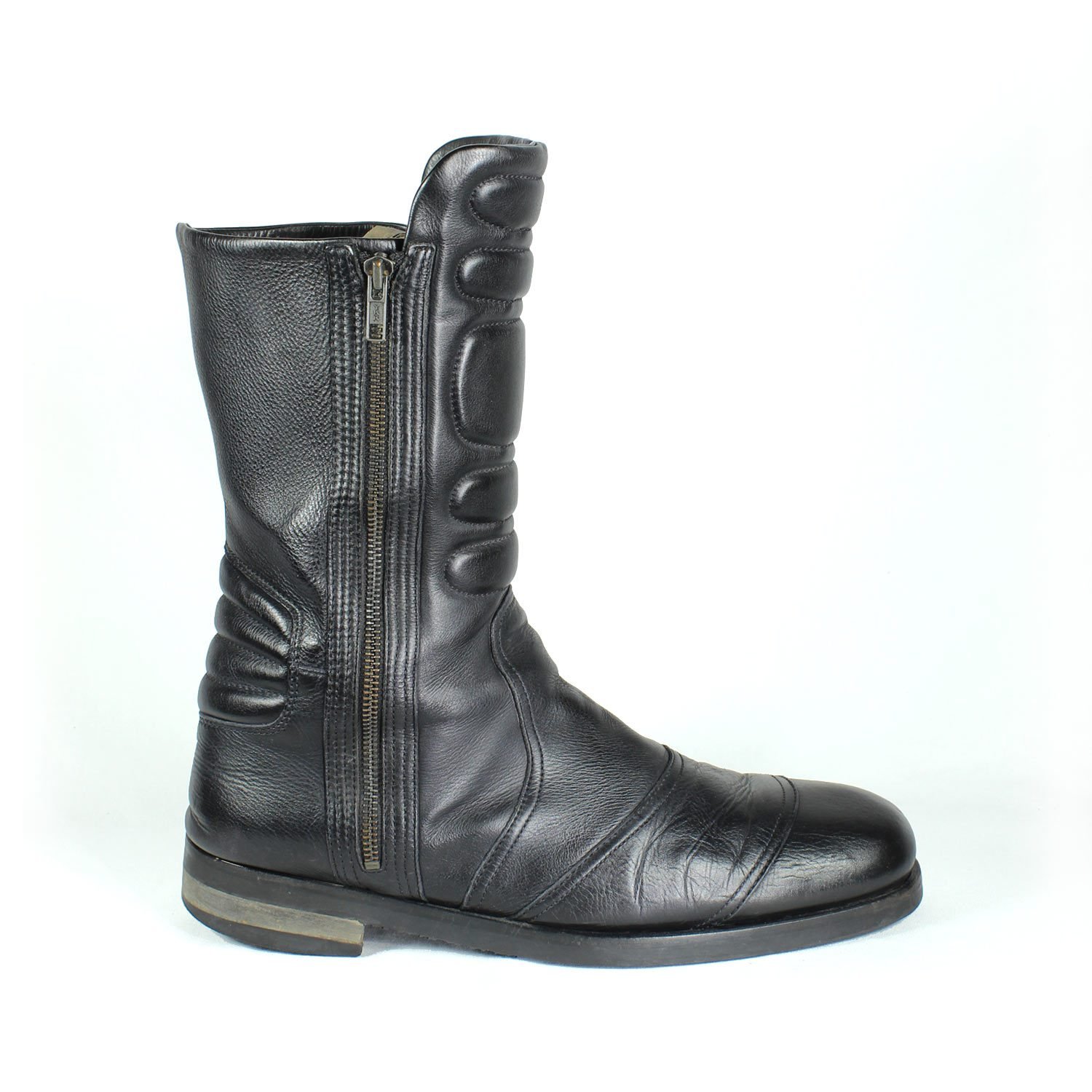 A pair of black Hugo Boss high-quality leather boots, size 47, in good condition. Features a classic, rugged cruiser-style look suitable for motorcycle riding. Made from durable leather with typical minor wear marks and wrinkles.