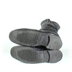 A pair of black Hugo Boss high-quality leather boots, size 47, in good condition. Features a classic, rugged cruiser-style look suitable for motorcycle riding. Made from durable leather with typical minor wear marks and wrinkles.