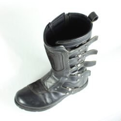 A pair of black ICON ONE THOUSAND 12" full-grain leather motorcycle boots, size 47, in good condition. Features ankle armor, reinforced shifter and shin protection, water-repellent leather, and a Goodyear welt construction. Shows typical wear, a missing screw on a back plaque, and a minor buckle flaw that does not hinder function.