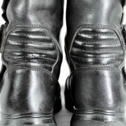 A pair of black Louis street riding boots, size 40/41, in good condition. Made of durable leather with essential impact protection for the toes, heel, and around the gear and brake levers. Shows typical leather wrinkles and some wear marks.