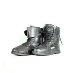 A pair of black Polo street riding boots, size 43, in good condition with minor wear marks and leather wrinkles. Features durable leather and textile construction, a PoloTex waterproof membrane, integrated reflective stripes, and reinforced impact protection for toes, ankles, and sole.