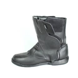 A pair of black Polo touring motorcycle boots, size 42, in good condition. Made of synthetic leather with waterproofing, featuring protection for toes, shin, ankles, heel, and a reinforced sole. Shows minor wear and wrinkles.