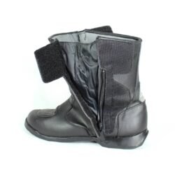 A pair of black Polo touring motorcycle boots, size 42, in good condition. Made of synthetic leather with waterproofing, featuring protection for toes, shin, ankles, heel, and a reinforced sole. Shows minor wear and wrinkles.