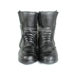 A pair of black Polo touring motorcycle boots, size 42, in good condition. Made of synthetic leather with waterproofing, featuring protection for toes, shin, ankles, heel, and a reinforced sole. Shows minor wear and wrinkles.