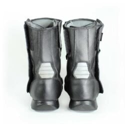 A pair of black Polo touring motorcycle boots, size 42, in good condition. Made of synthetic leather with waterproofing, featuring protection for toes, shin, ankles, heel, and a reinforced sole. Shows minor wear and wrinkles.