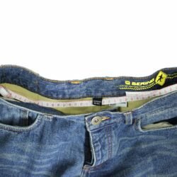 A pair of blue Bering motorcycle jeans, size M (84 cm waist), in like-new condition. Features a straight-cut casual denim style with a cotton shell and a Kevlar-blend lining for abrasion resistance, plus integrated knee protectors.