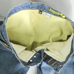 A pair of blue Bering motorcycle jeans, size M (84 cm waist), in like-new condition. Features a straight-cut casual denim style with a cotton shell and a Kevlar-blend lining for abrasion resistance, plus integrated knee protectors.