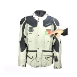 A black and beige Dainese D-Explorer adventure motorcycle jacket, size 58, in very good condition. Features an advanced modular flap system for ventilation, pockets for shoulder, elbow, and back protectors, and a removable rear exhaust vent. The jacket includes a replaceable country flag patch.