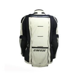 A black and beige Dainese D-Explorer adventure motorcycle jacket, size 58, in very good condition. Features an advanced modular flap system for ventilation, pockets for shoulder, elbow, and back protectors, and a removable rear exhaust vent. The jacket includes a replaceable country flag patch.