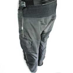 A pair of black Geneze waterproof textile motorcycle pants, size 2XL (96 cm stretch waist), in good condition. Features a Reissa-membrane, knee protectors, multiple adjustment points, reflective details, and leather reinforcements for durability.
