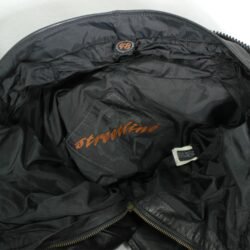 A pair of black Hein Gericke Streetline leather motorcycle pants, size 48 (85 cm waist), in good condition. Features a classic café-racer style with foam knee protectors. Hip protectors have been removed, leaving visible stitch holes but not affecting function.